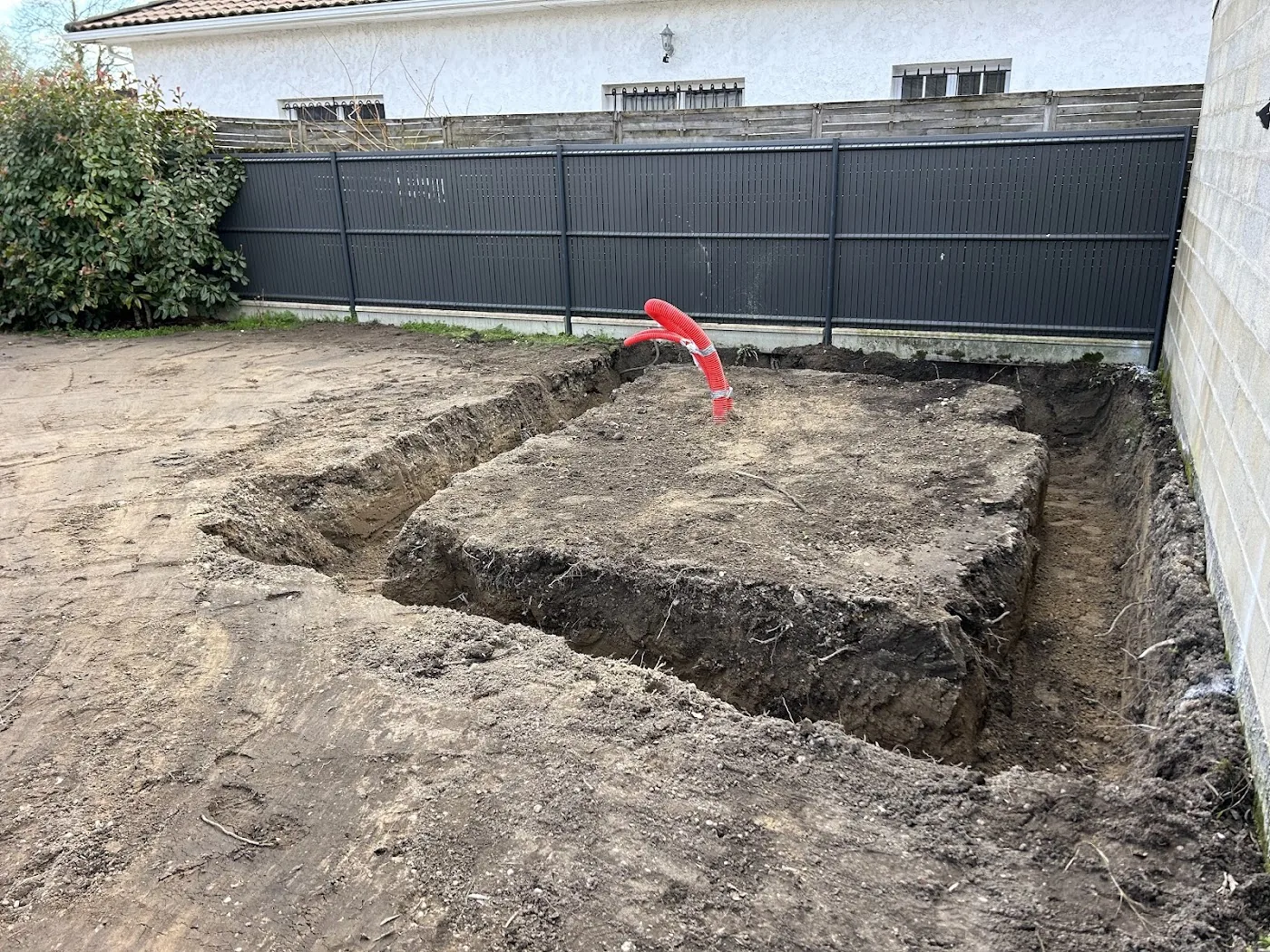 Terrassement et préparation de terrain pour fondation de garage